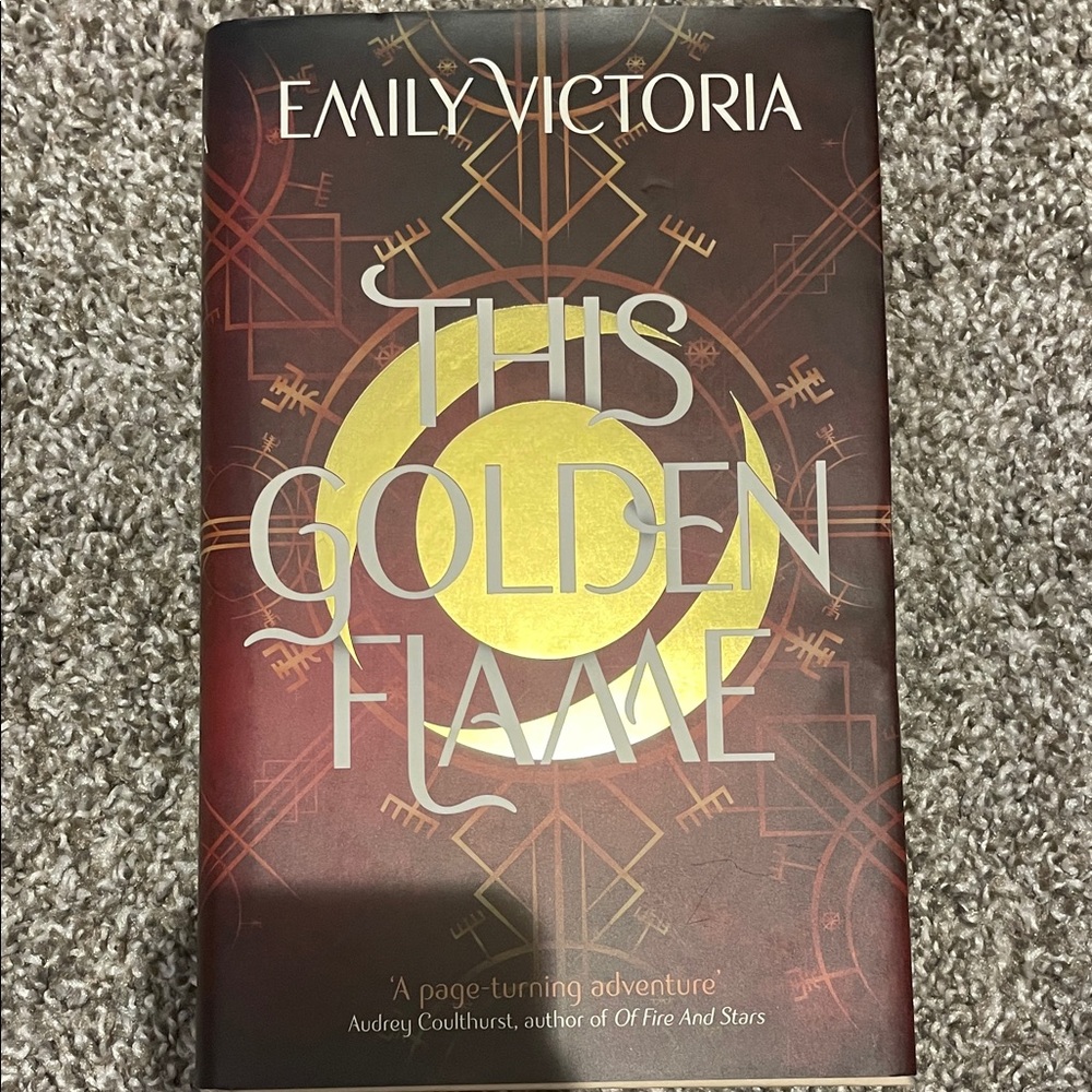This Golden Flame Book by Emily Victoria